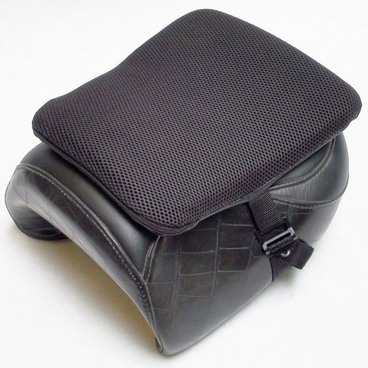 Motorcycle seat with a gel cushion on top of it