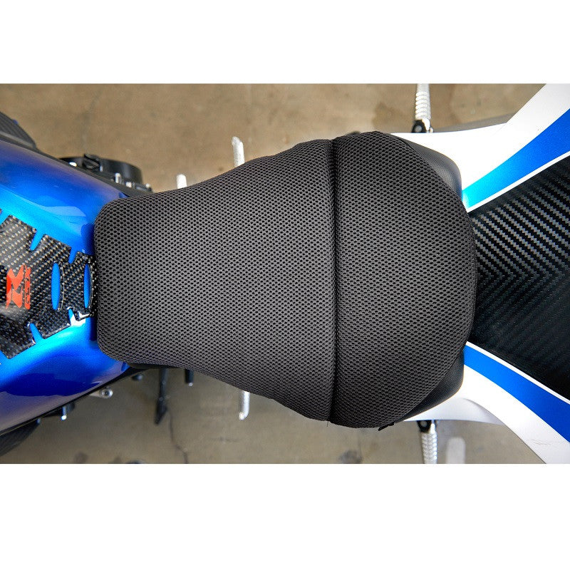 Gel seat cushion on top of a blue motorcycle 